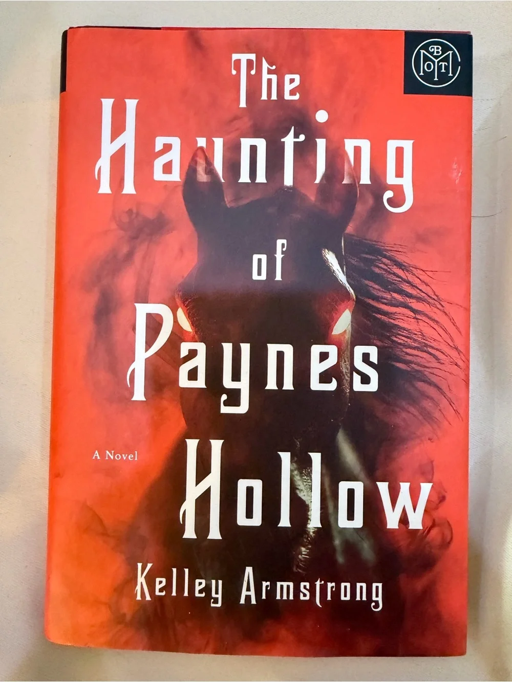 The Haunting of Paynes Hollow - Red Hardcover Novel